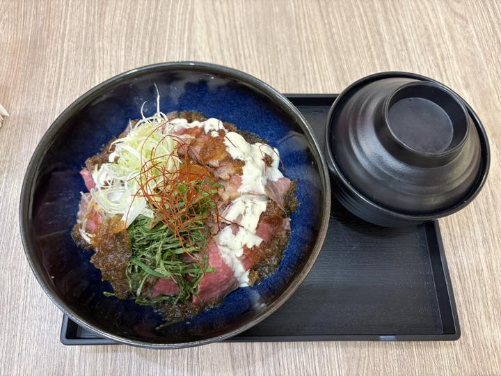 A Japanese home-cooking rice bowl served with a bowl of miso soup